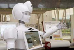 酷比機器人能夠在國立公共資訊圖書館一樓進行移動導覽。（潘云薇攝）