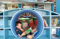 啟明國小瀚海閣裡的小蝸居，是學童閱讀時的秘密基地。
